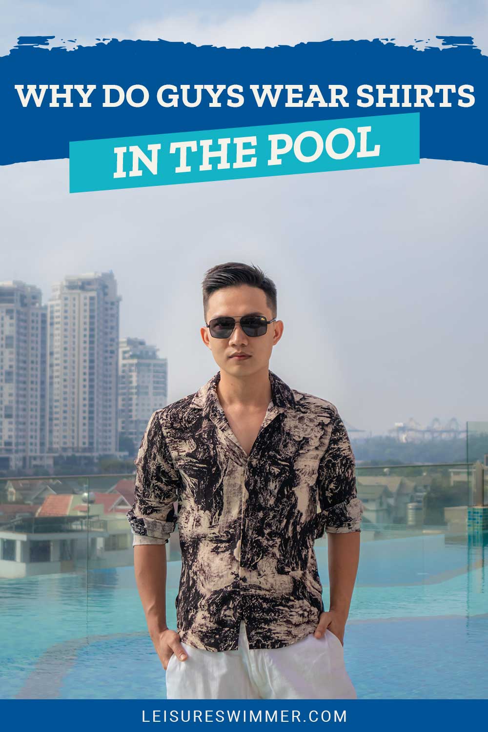 Guy with black sunglasses in front of a pool - Why Do Guys Wear Shirts In The Pool