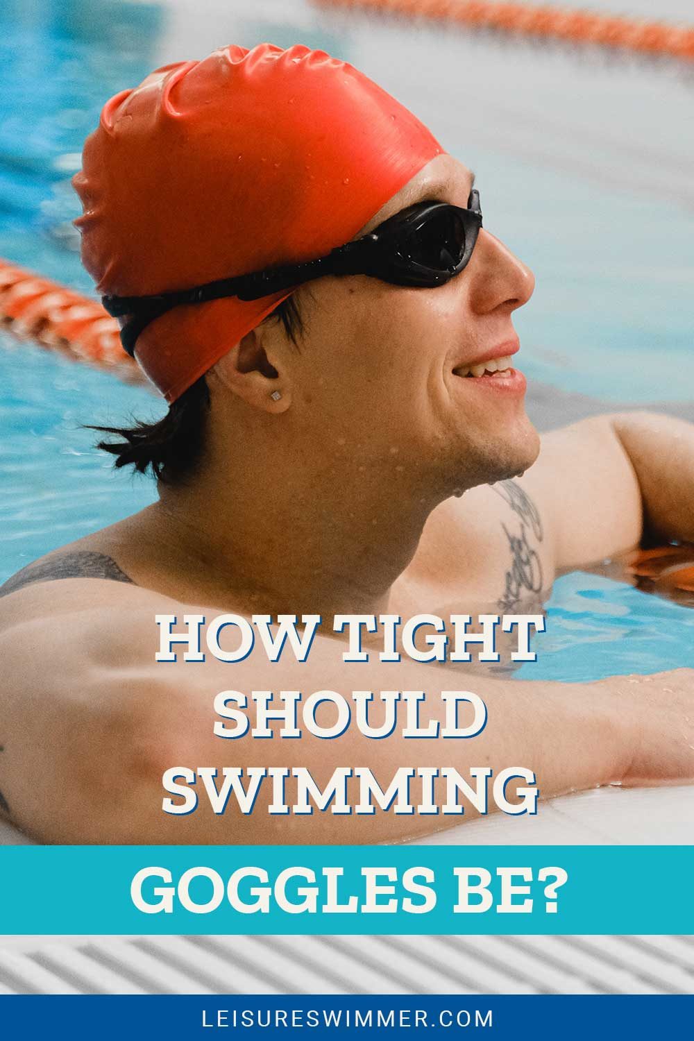 Man wearing swimming goggles smiling - How Tight Should Swimming Goggles Be?